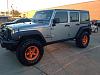 Click image for larger version

Name:	The Jeep with orange wheels.jpg
Views:	1470
Size:	65.8 KB
ID:	541549