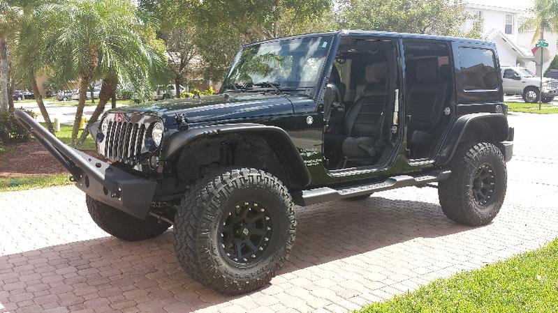 Want a pic of a 4-door with 2.5 spring lift, 35 tires and Bushwacker flat  flares! - Page 2 -  - The top destination for Jeep JK and JL  Wrangler news