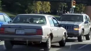 Jeep Driver Taunts Car While Going 45 MPH in Reverse