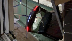 Valet Crashes Jeep Through Building Into Pool