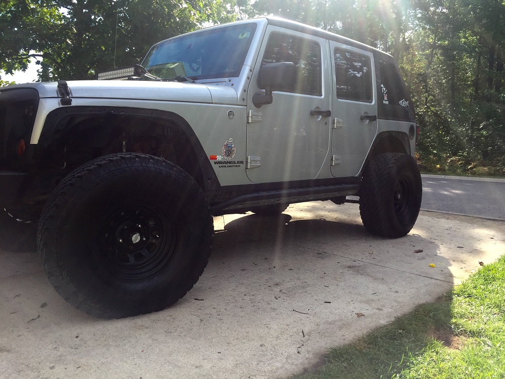 Protecting Your Jeep: Rock Rails or Body Sliders?