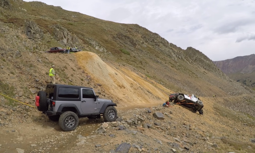 Jeep rolls down mountain