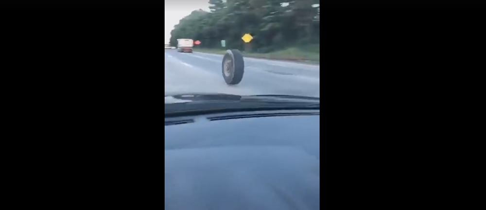 jk-forum.com Runaway Truck Tire Smashes into JK Jeep Wrangler Unlimited