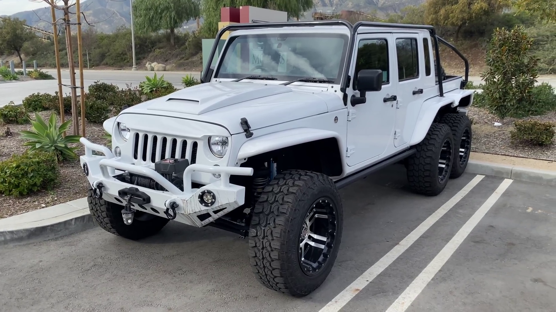 Jeep JK Wrangler Six-Wheeler Pickup Defies All Logic